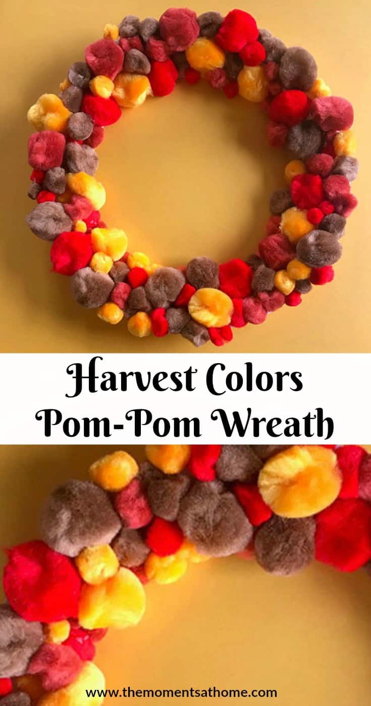 Make a pom-pom fall wreath with this Thanksgiving paper plate craft for kids. #thanksgivingcraftforkids #paperplatecrafts 