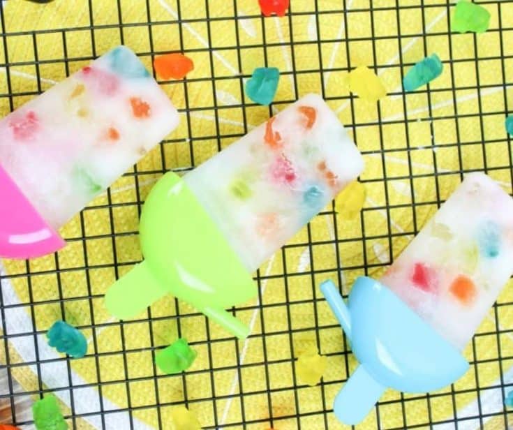 homemade fizzy soda popsicles on a rack