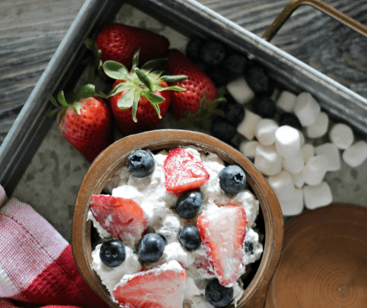 bowl full of pudding and berry salad