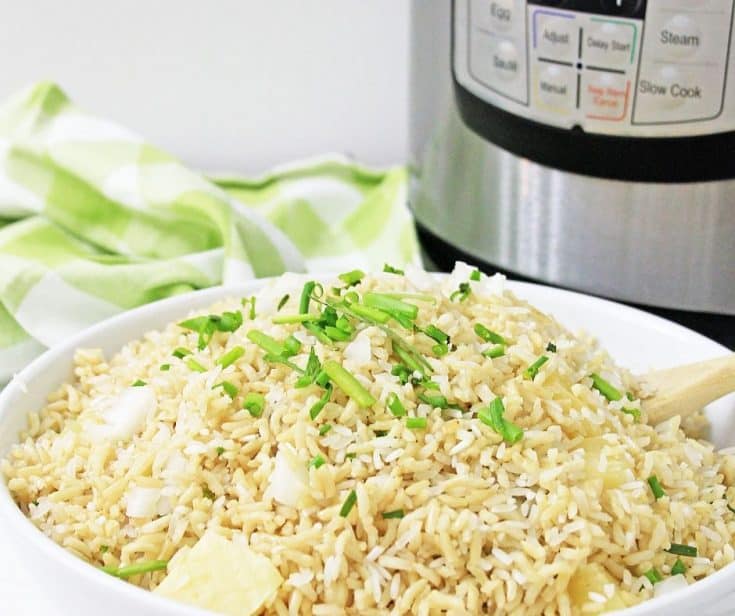 instant pot in background with basmati rice in a bowl