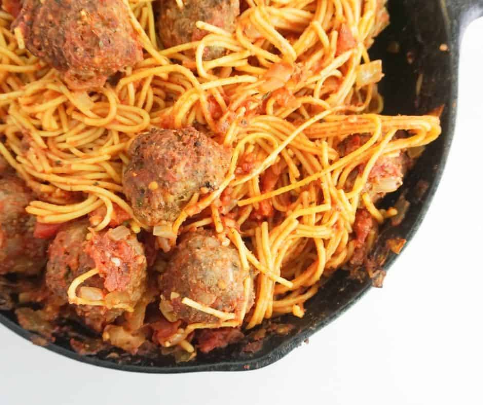 one dish spaghetti and meatballs weeknight dinner in a cast iron skillet