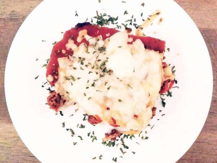 This low carb meatloaf is like a slice of giant meatza. The recipes doesn't use pork rinds at all, and is an Italian treat.