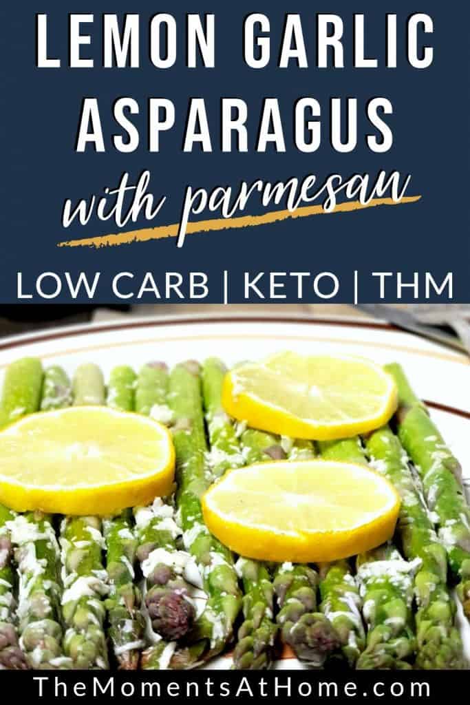 roasted asparagus topped with lemon rounds and parmesan cheese  by The Moments At Home