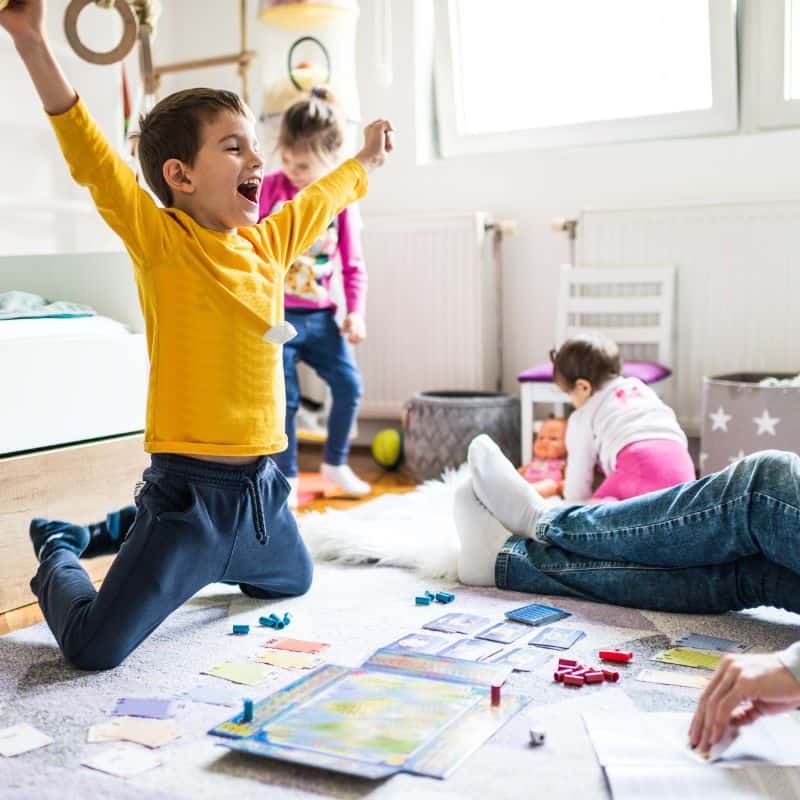 child winning a board game