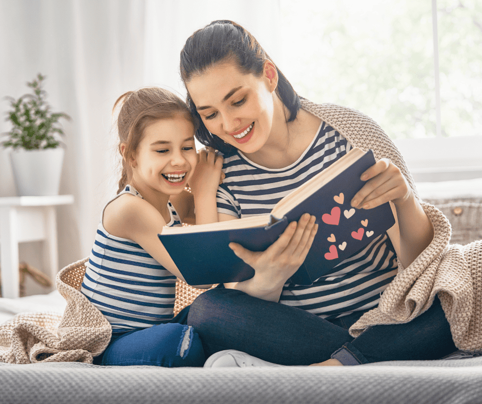 mom and daughter reading a book about love